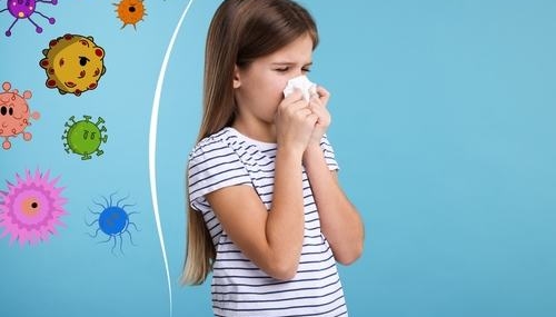 Little,Girl,With,Tissue,Sneezing,On,Light,Blue,Background.,Immunity